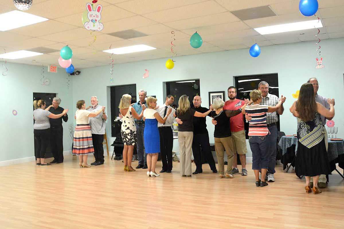 Couples dancing together at a Dance Passion group class